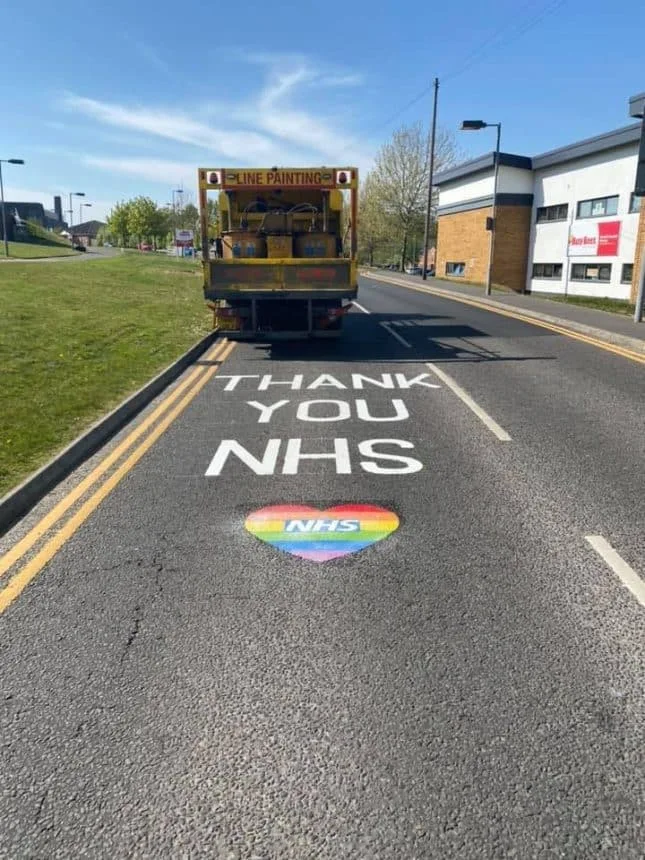 Thank you NHS road marking with an ambulance